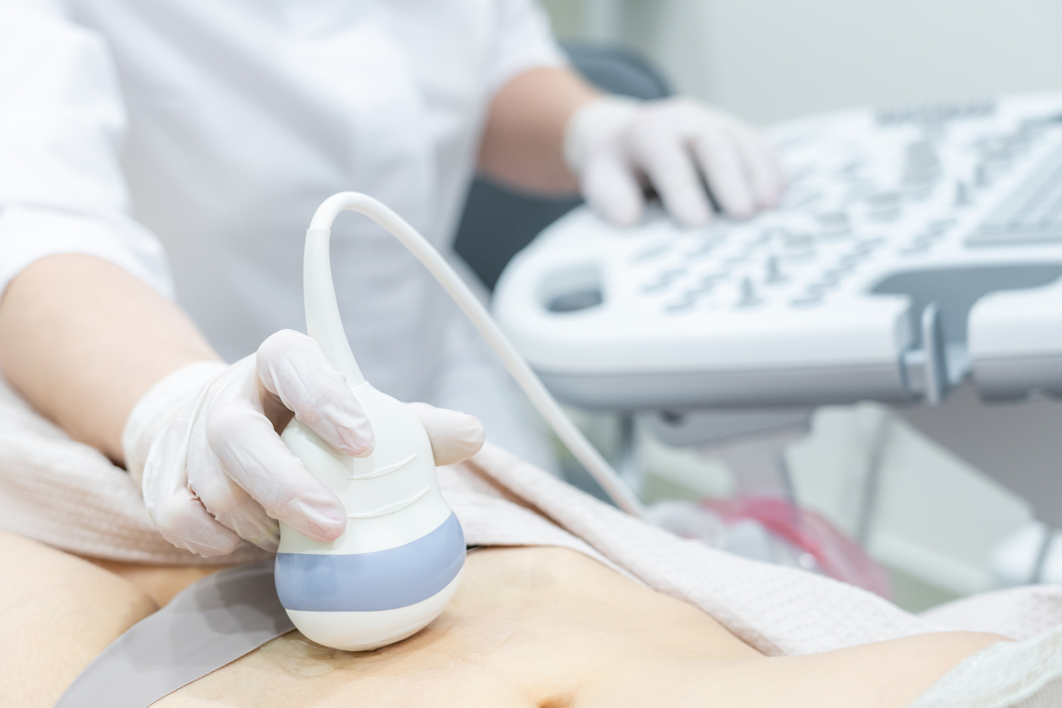 Gynecologist doing ultrasound scan in modern clinic